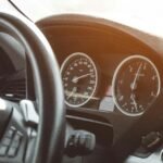 Close-up of a car's speedometer and dashboard representing accelerated growth marketing for startups